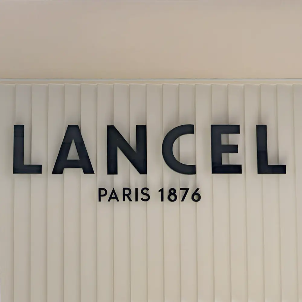 Logo Lancel in plexiglass nero - Seven Group